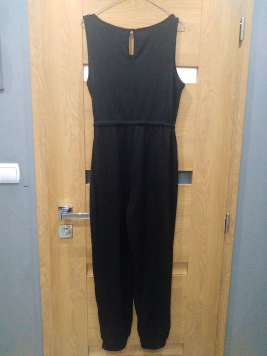 Fajny czarny kombinezon rozm M/XL biust 96/110cm