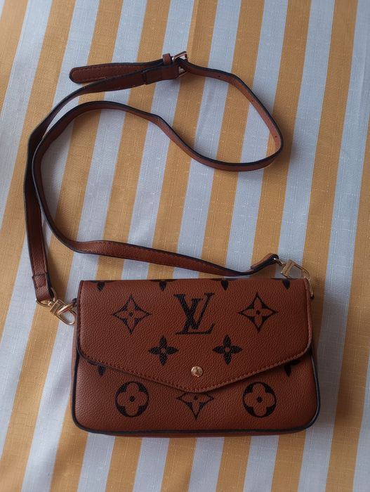 Skórzana kopertówka oryginalna Louis Vuitton