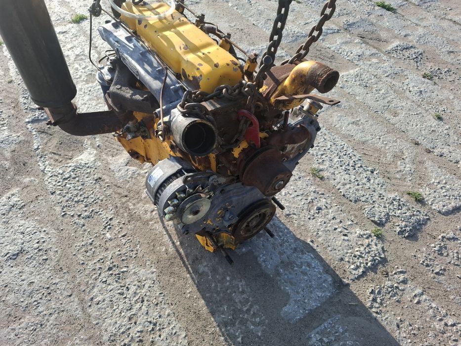 Silnik perkins 4cyl mf ursus landini jcb cat pompa wspomagania pokrywa