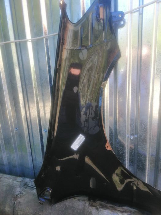 Крило на Mitsubishi Lancer ліве переднє 2004-2008р