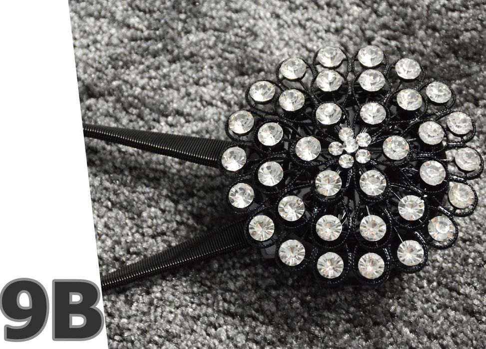 2 czarne spinki do zasłon na magnes