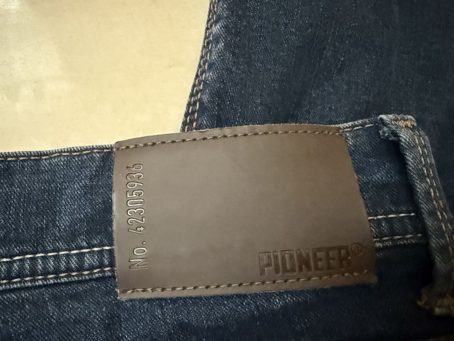 Jeansy Pionier meskie