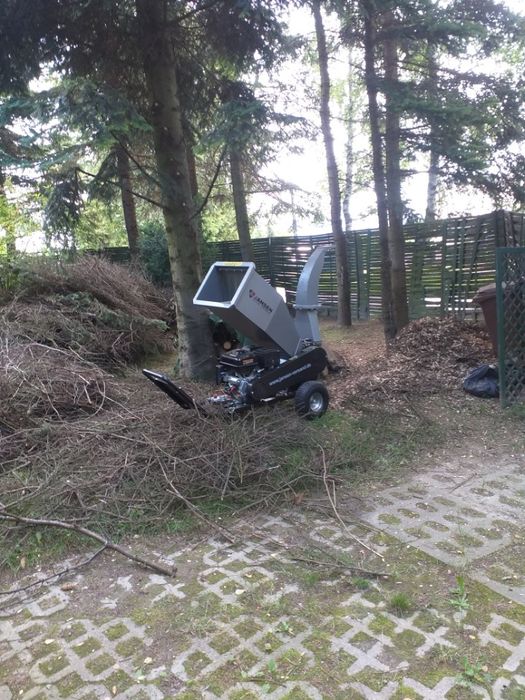 Uslugi rebakiem  karczowanie  wycinka pielęgnacja ogródków wywóz