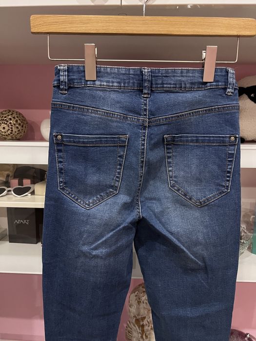 Nowe spodnie jeansowe Reserved r. S