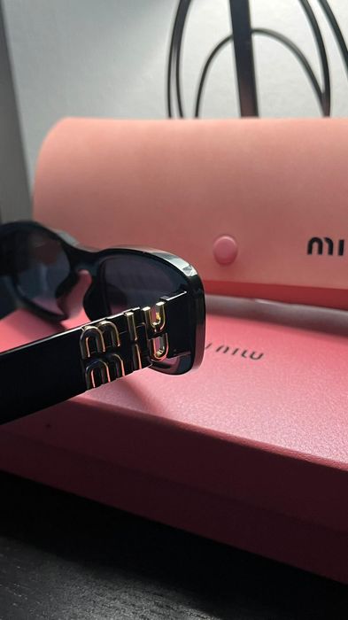 Óculos de sol miumiu