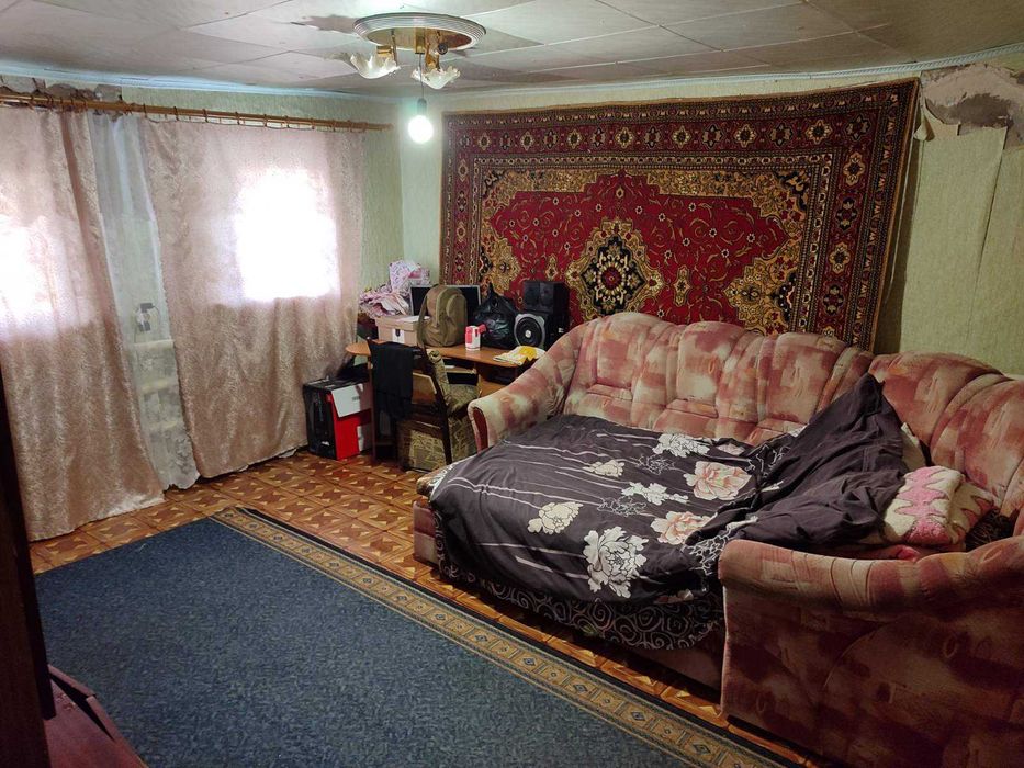 Продам дом в центре Рогани