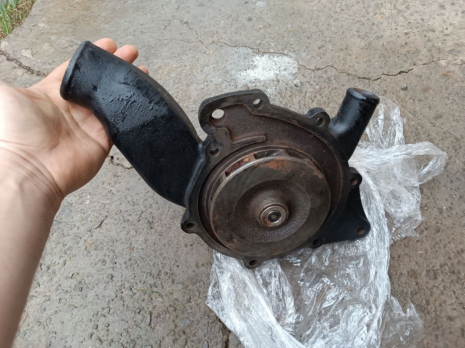 Помпа двигуна автобуса MAN 6.8 T.DI