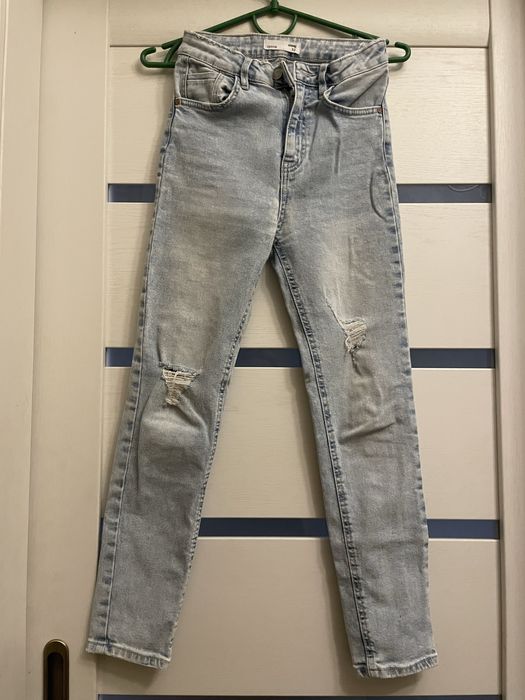 Жіночі джинси на високій таліі