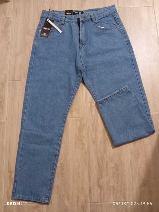 Calças de ganga novas