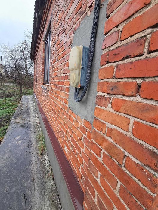 Продаж цегляного будинку