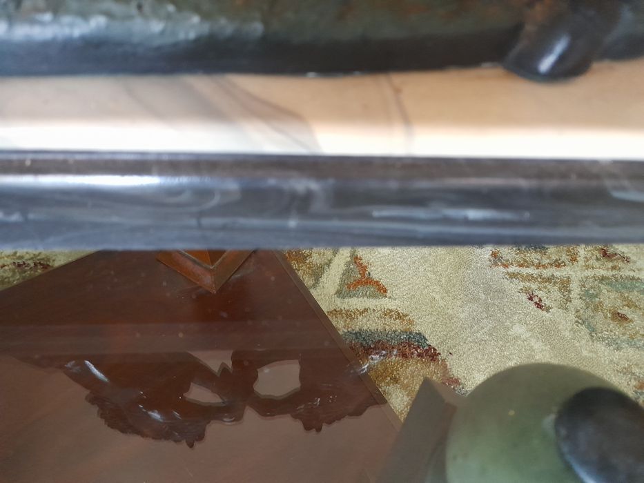 Peça porcelâmica de dois cavalos