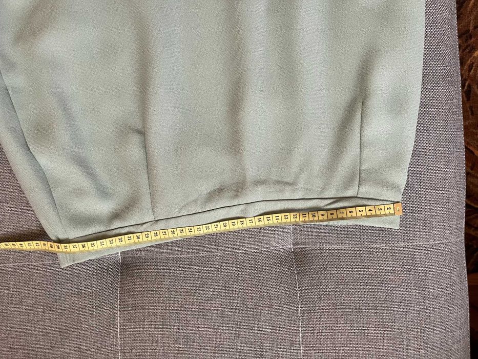 Zielonkawa garsonka firmy SUITSME