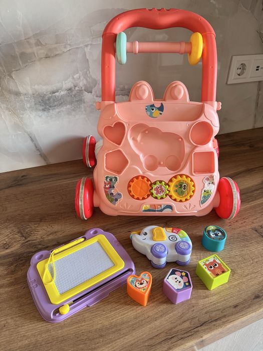 Дитяча каталка ходунки