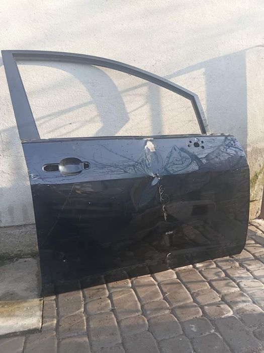 Двері Ніссан Тііда