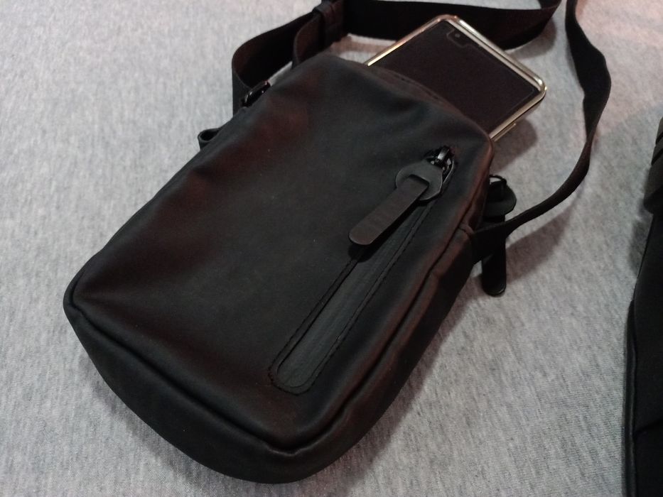 Bolsa mochila tiracolo