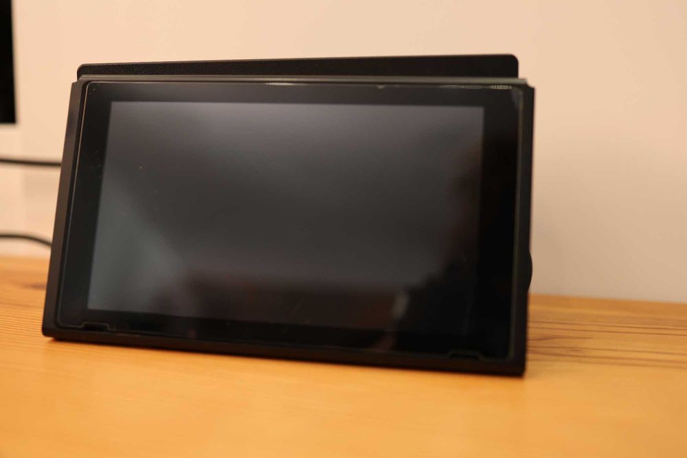 Nintendo Switch com acessórios e jogos