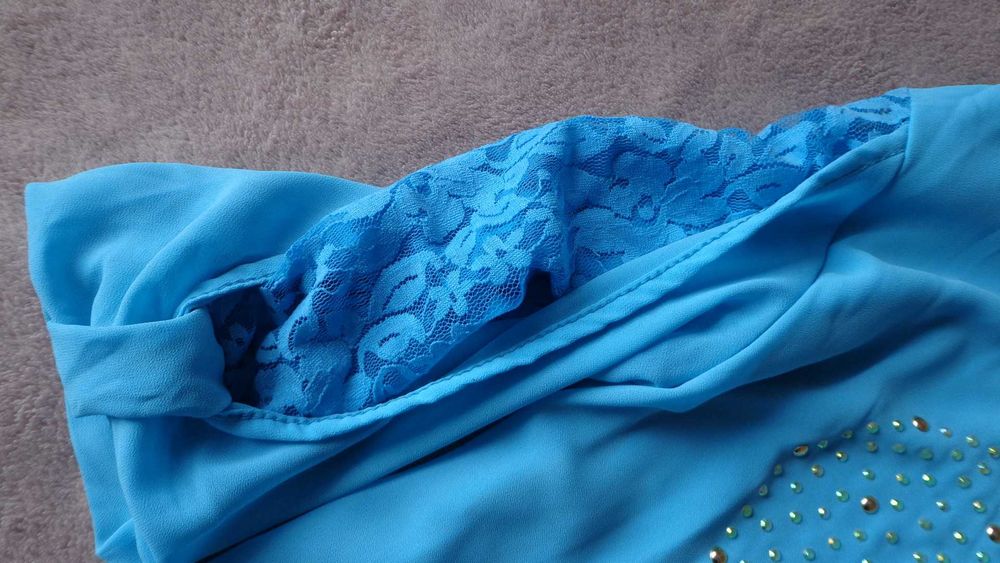 Бірюзова   блузка