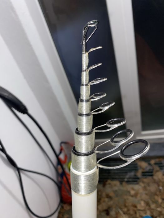 Cana pesca Tubertini Linea Next 6m + Carreto daiwa sweepfire 4000 + conjunto piões
