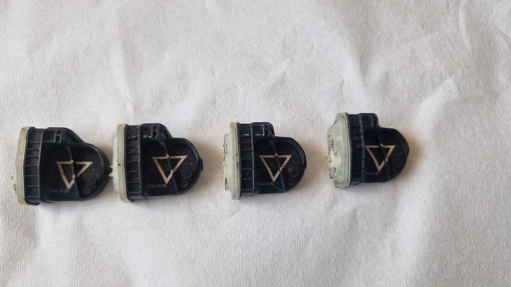 Czujniki ciśnienia opon TPMS FAGT-1A180-DD Ford Fiesta Focus Kpl.