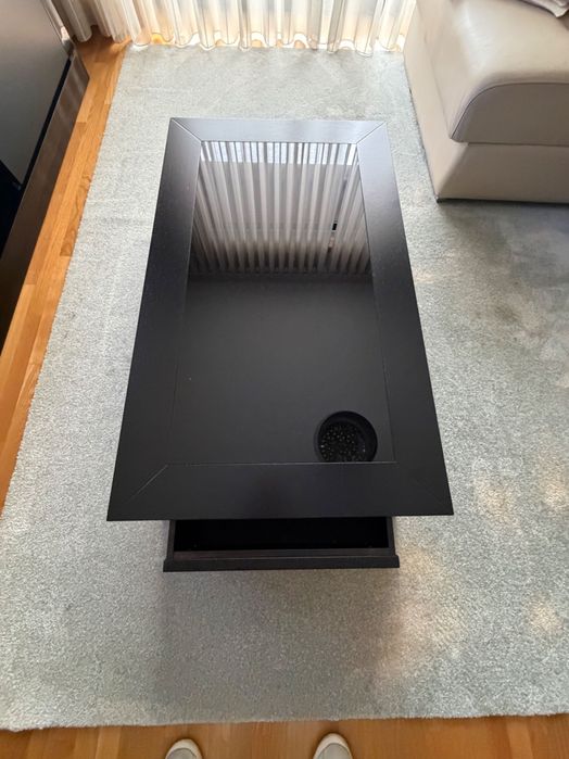 Mesa de centro preta com vidro