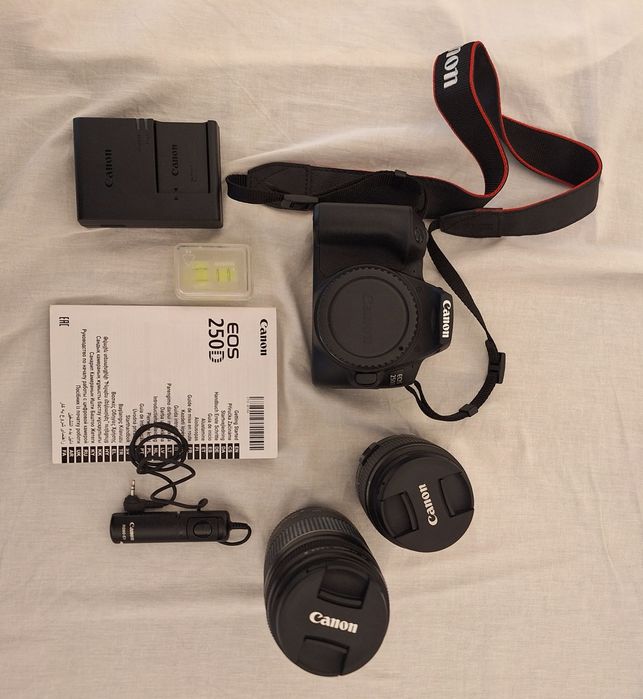 Camara fotográfica Canon EOS 250D com 2 lentes, mochila e tripé