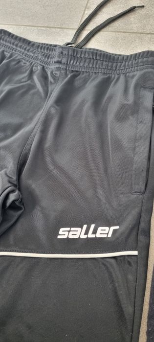 Saller spodnie pilkarskie 128 i getry Nike