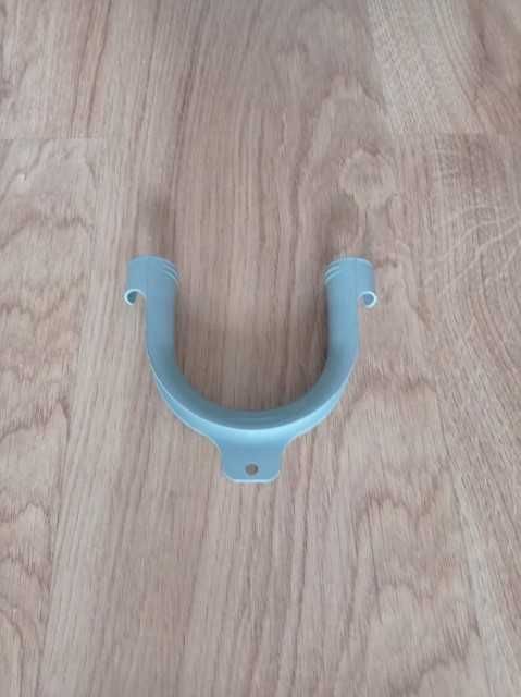 Uchwyt węża odpływowego do pralki