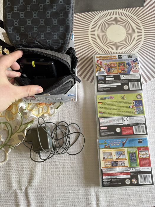 Nintendo DS Lite z szesc grami ( Super Mario, Donkey Kong, Yoshi, Pokemon)