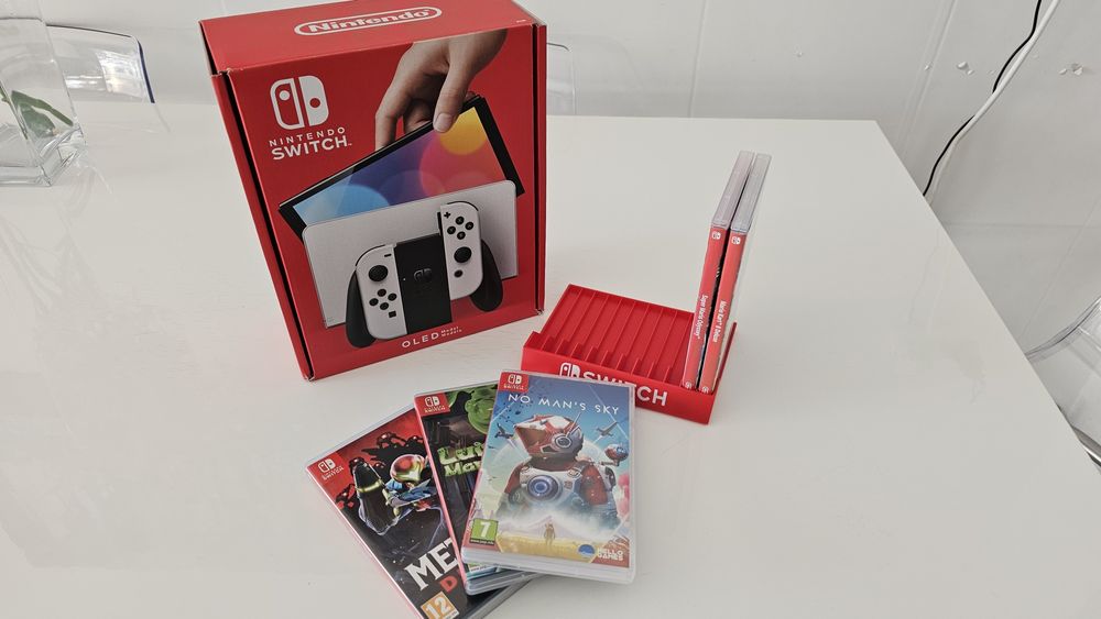 Nintendo switch Oled + 5 jogos tudo como novo