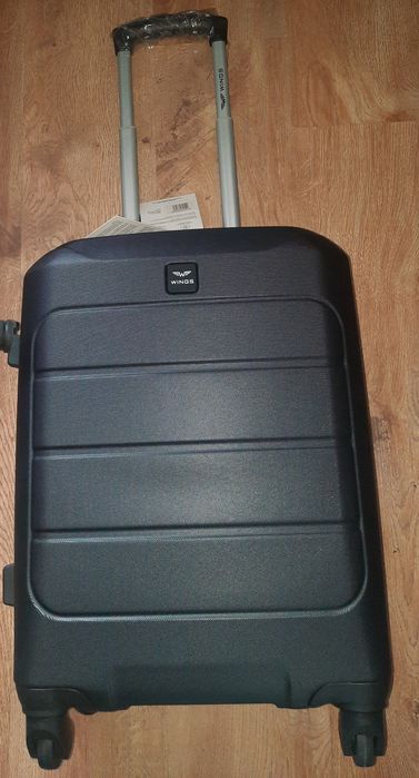 Nowa walizka wings, mała,