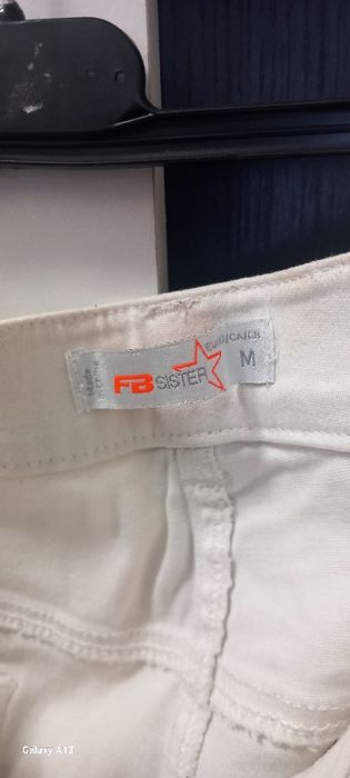 Spodnie białe. Damskie