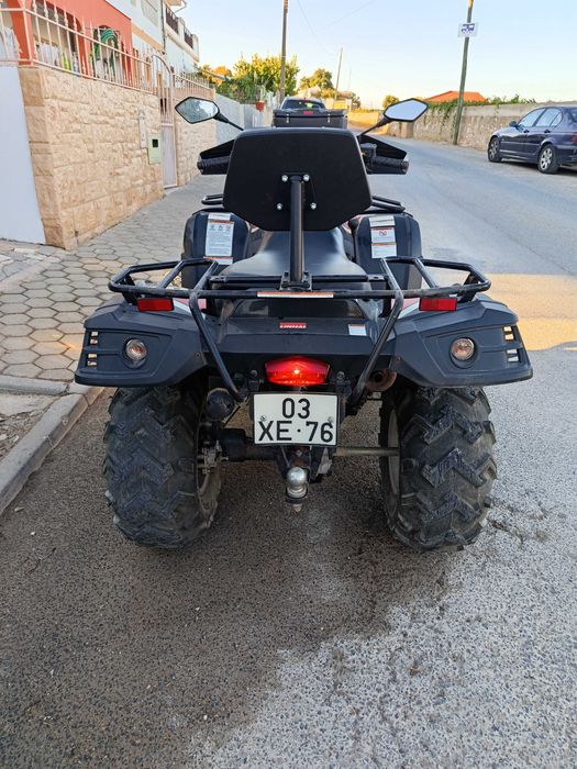 Vendo moto 4x4 com pouco uso e km