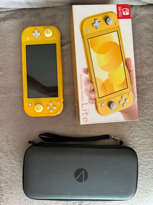 Nintendo Switch Lite Amarela (Como Nova + Caixa e Extras)