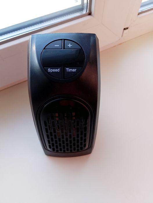 Портативный мини-обогреватель Handy Heater.