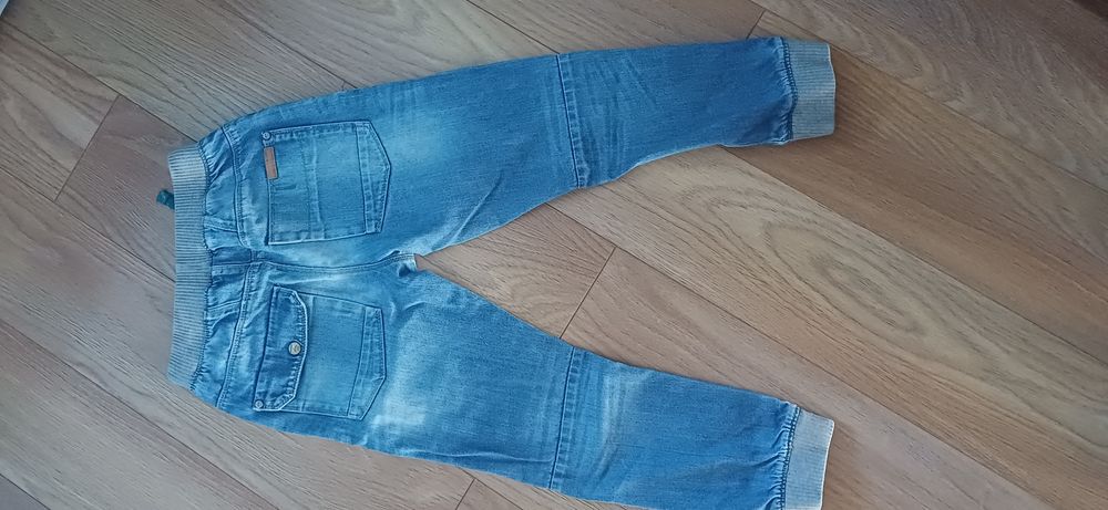 Dżinsowe spodnie next r 140