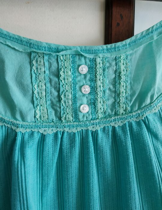 Casaco malha azul turquesa e top alças