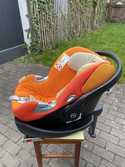 Автокрісло Cybex , помаранчевого кольору