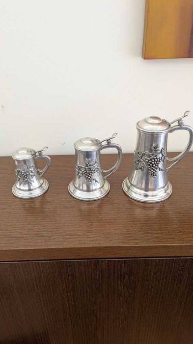 Conjunto de peças em estanho novo.