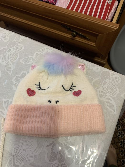 Шапочки до року дівчинки