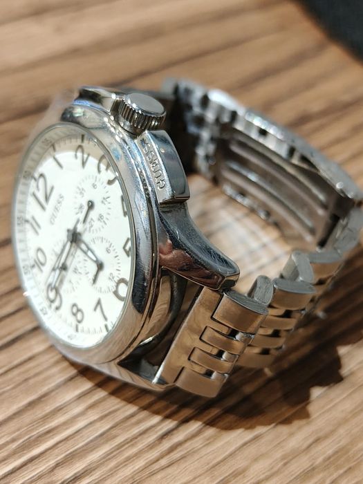 Piekny zegarek męski Guess na bransolecie, model W10562G1