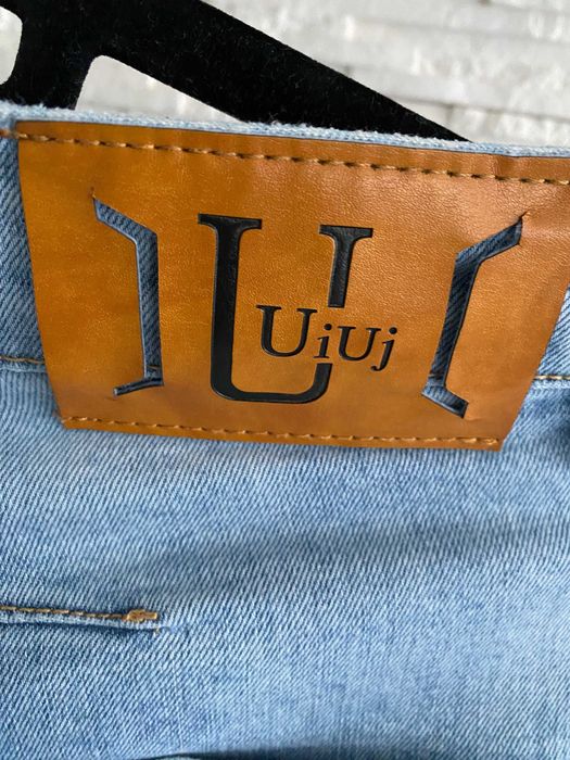 Uiuj dżinsy z serduszkiem ozdobna kieszeń - stan - szersza nogawka