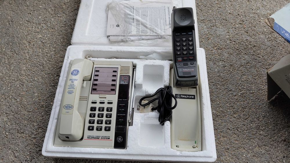 Telefones de colecção completos na caixa