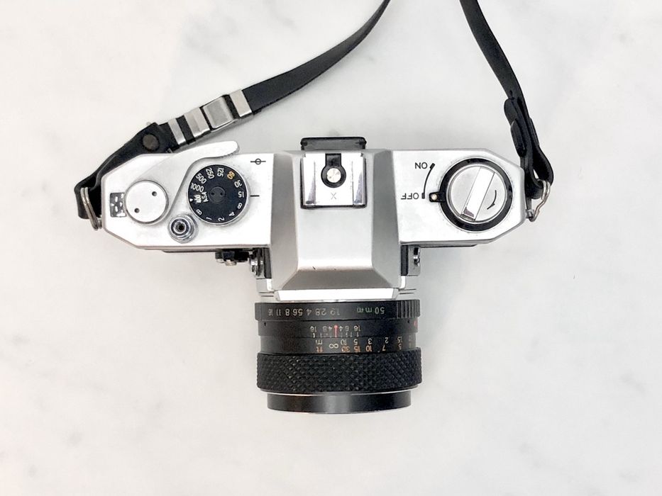 Yashica FX-2 + 50mm f1.9 Lens + Flash64738831821955122