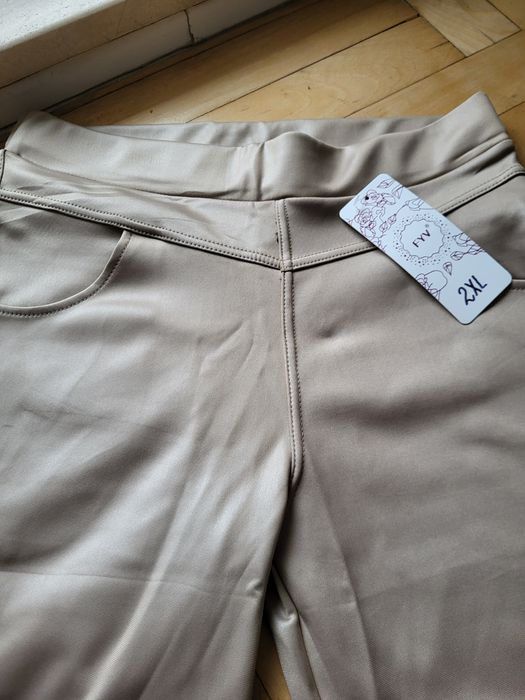 Spodnie leginsy jasny beż r. 44