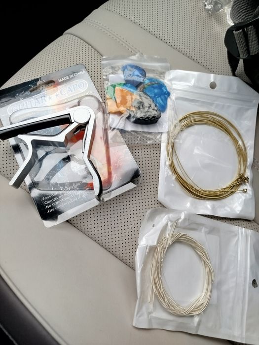 Струни медіатор каподастр