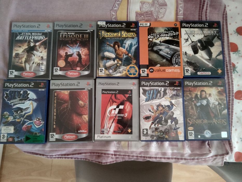 Lot de 21 video jogos para PS2 e PC (CDs riscados)