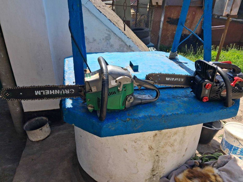 Бензопили Grunhelm GS5200M і Vitals