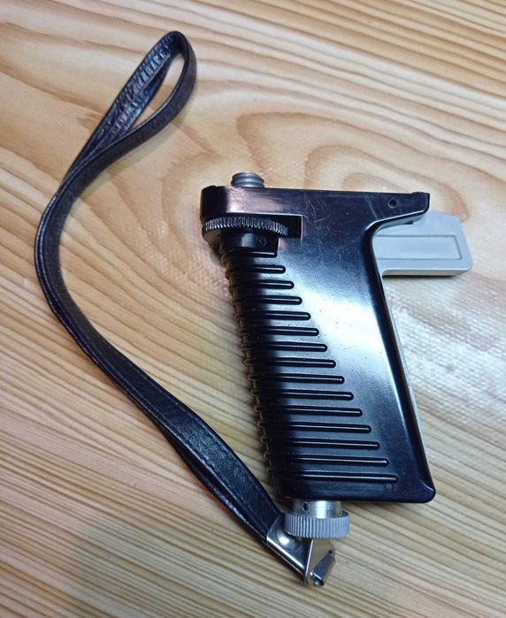 Ручка со спуском затвора кинокамеры