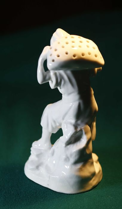 Paliteiro Ceramica Homen com Fardo