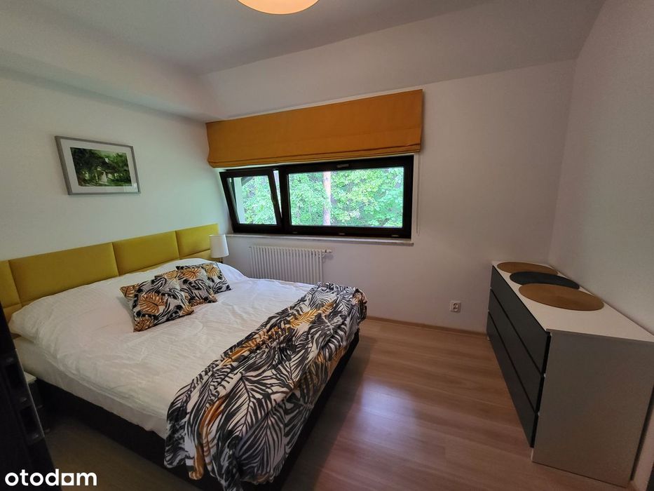 Przestronny apartament z balkonem i windą nad jeziorem Pluszne